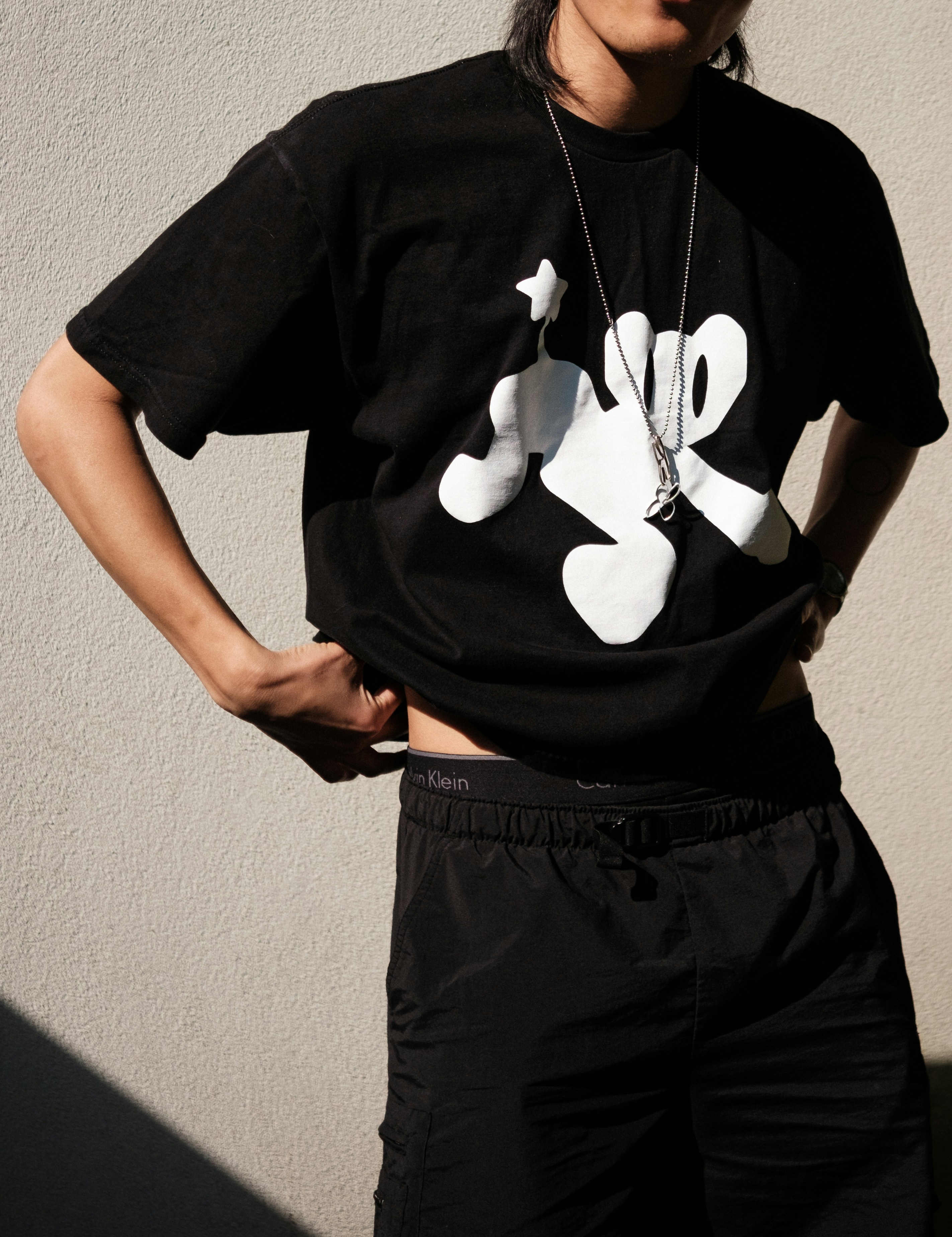 Graphic tee and cargo shorts streetwear look